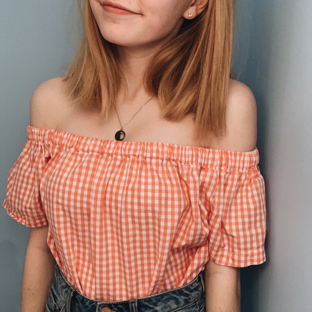 Orange and white checkered off the shoulder top
